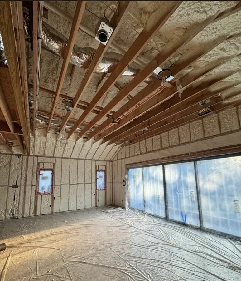 Interior walls and ceiling insulated with spray foam during new construction in Smyrna